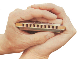 The "ten finger sandwhich" hand position for holding your harmonica.
